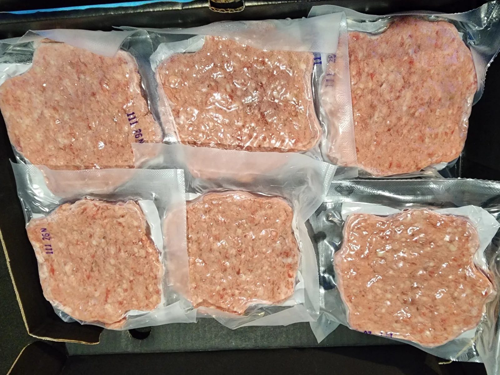 Vacuum-sealed Angus patties